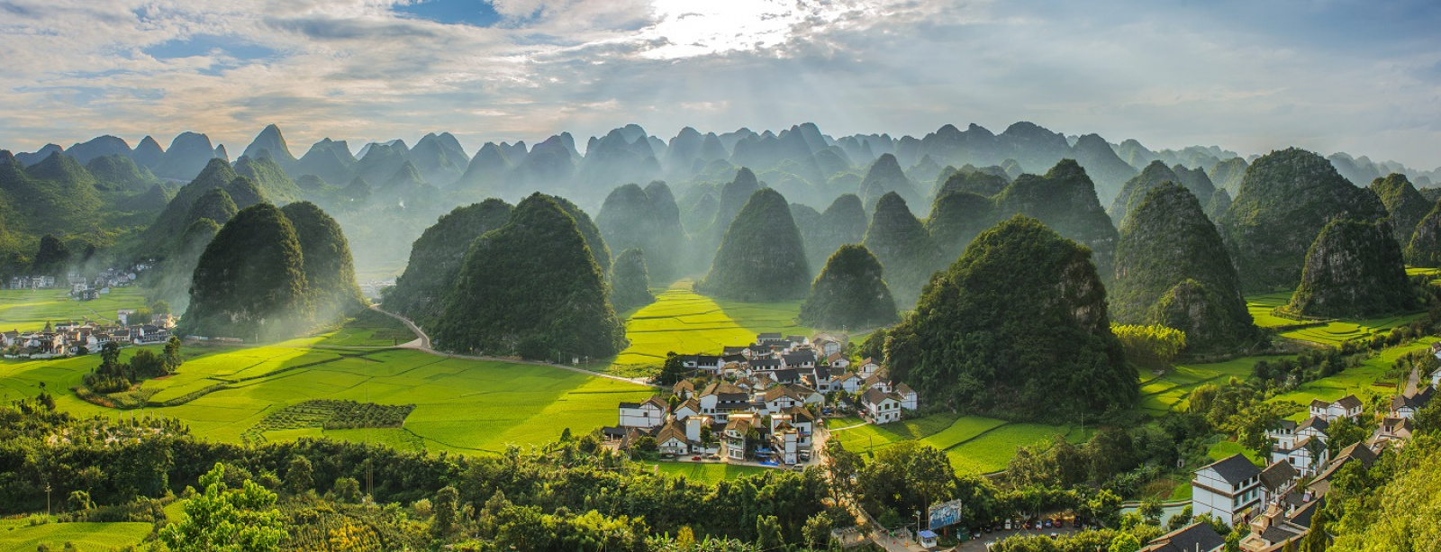 Xingyi UNESCO Global Geopark is located in the Xingyi City, Guizhou, China. Its Wanfenglin is a classic karst landscape with a forest of rocky peaks and karst valleys. [Photo credit: Ms. Cindy Choi]