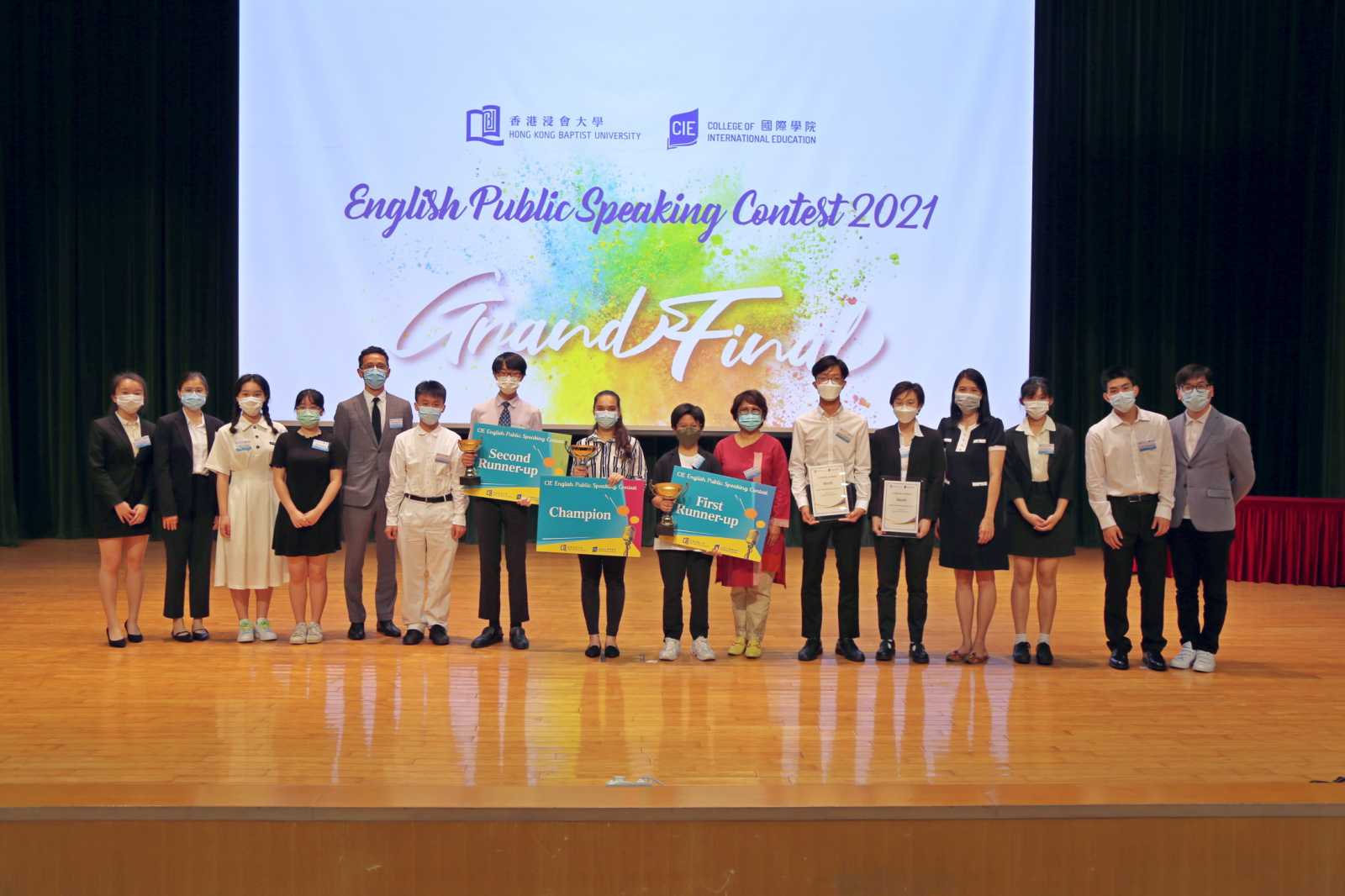 Judges of the Grand Final Mr. Martin Wong (fifth from left), Dr. Mable Chan (fourth from right), Dr. Theresa Cunanan (seventh from right) and the 12 finalists.