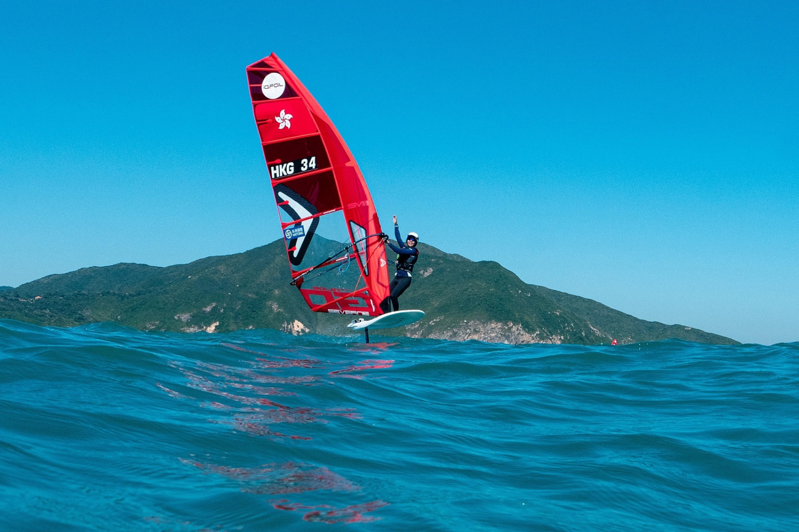Choy Wing Tung wins U19 Youth Girl Division Champion at the Hong Kong Open Windsurfing Championships.